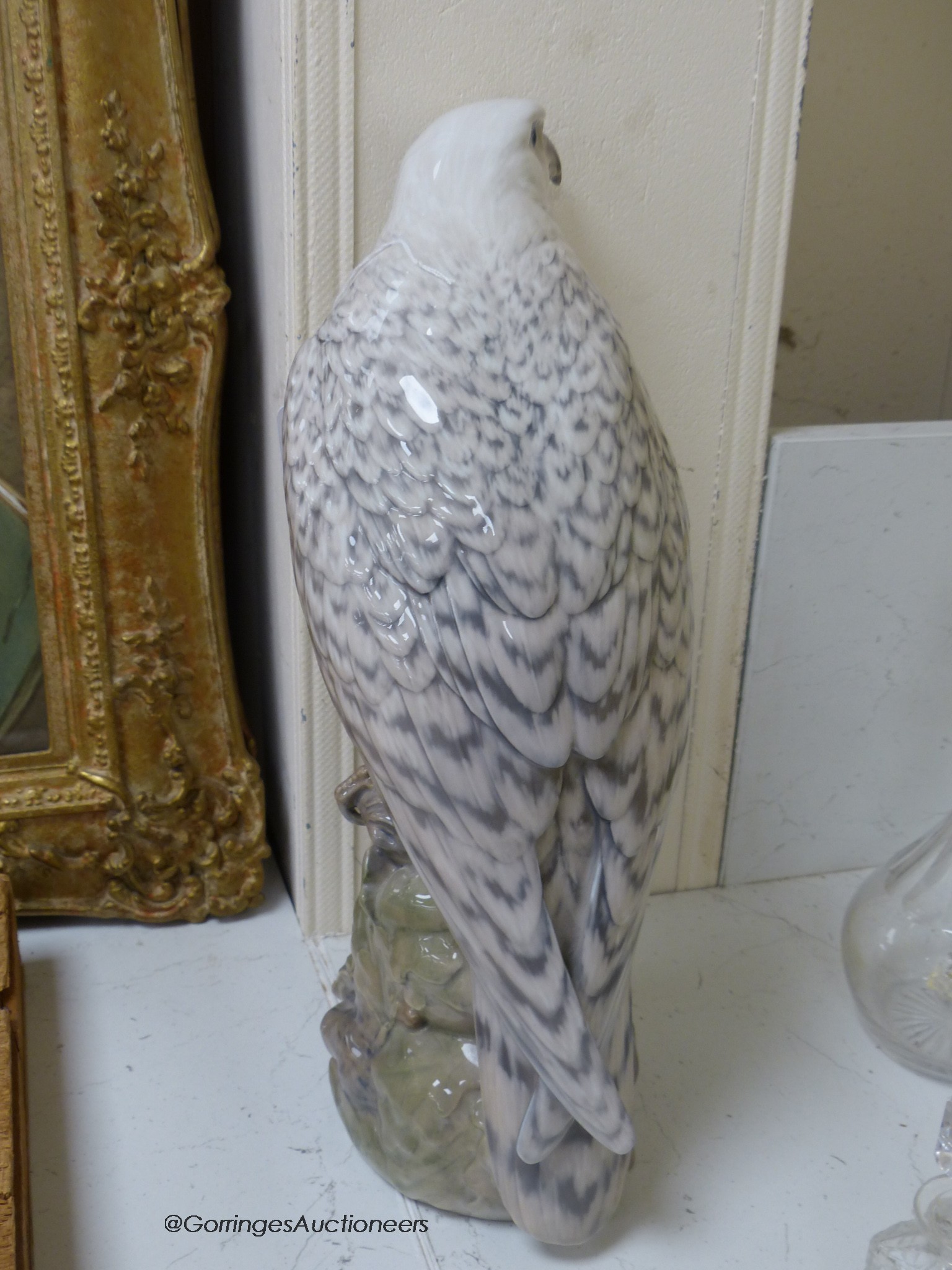 A Royal Copenhagen figure of an Icelandic Gyr falcon, model number 1661, 40 cm high